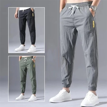 Ежедневни мъжки панталони Лято 2023 Нов стил Модерни улични леки свободни стръмни спортни панталони за джогинг голям размер Pantalons Pour Hommes
