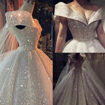 Луксозната бална рокля Сватбена рокля 2022 с V образно деколте, от искряща тъкан Дубай за младоженци с отворен гръб лъчисти бели официално облекло плюс размер