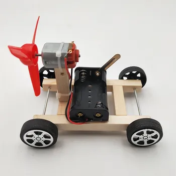 Малкият модел на играчки, електрически аеродинамична кола с едно крило, образователна играчка на научния експеримент 